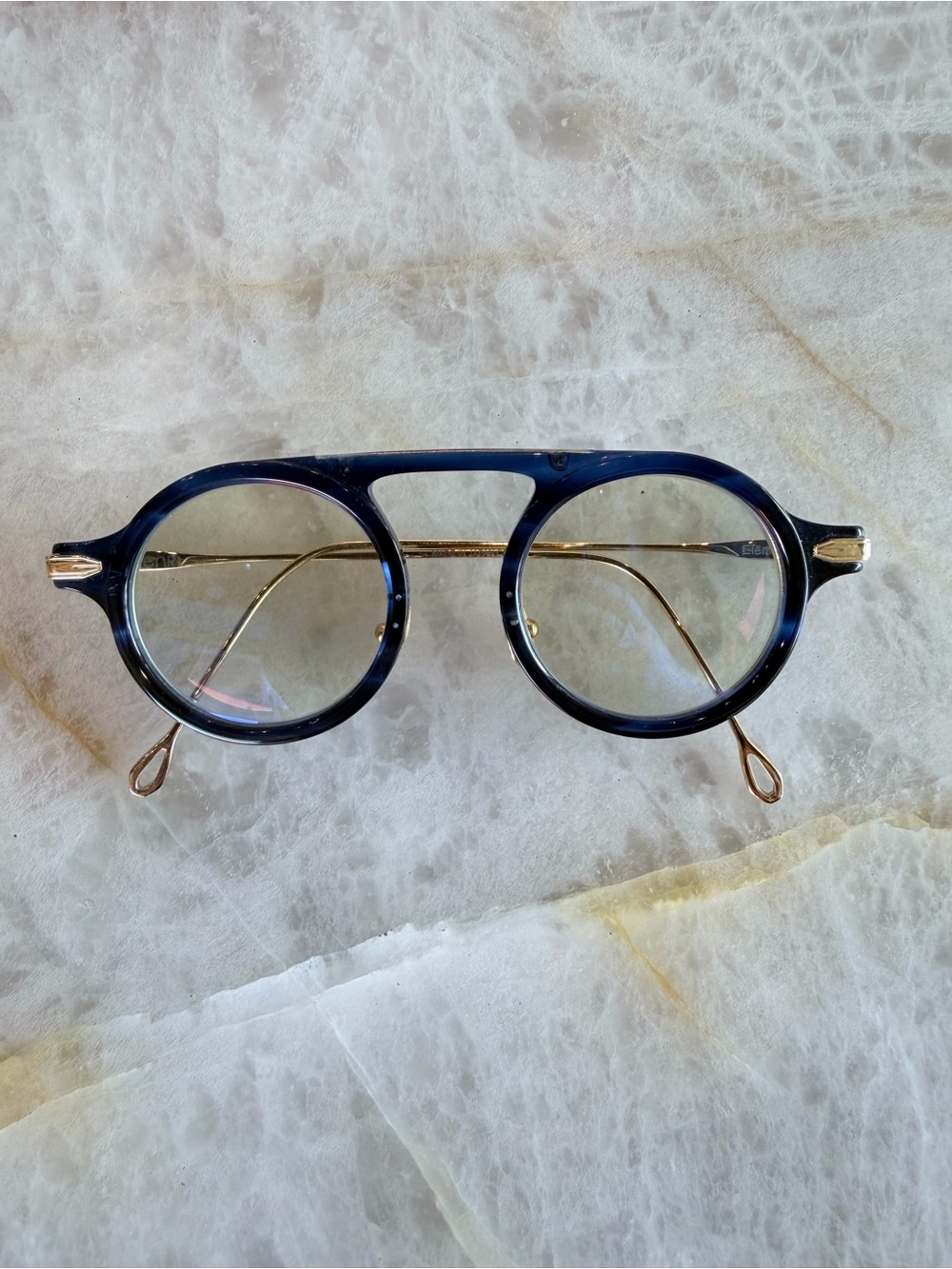 T Henri Element limited edition blue glasses with 18k gold plated titanium